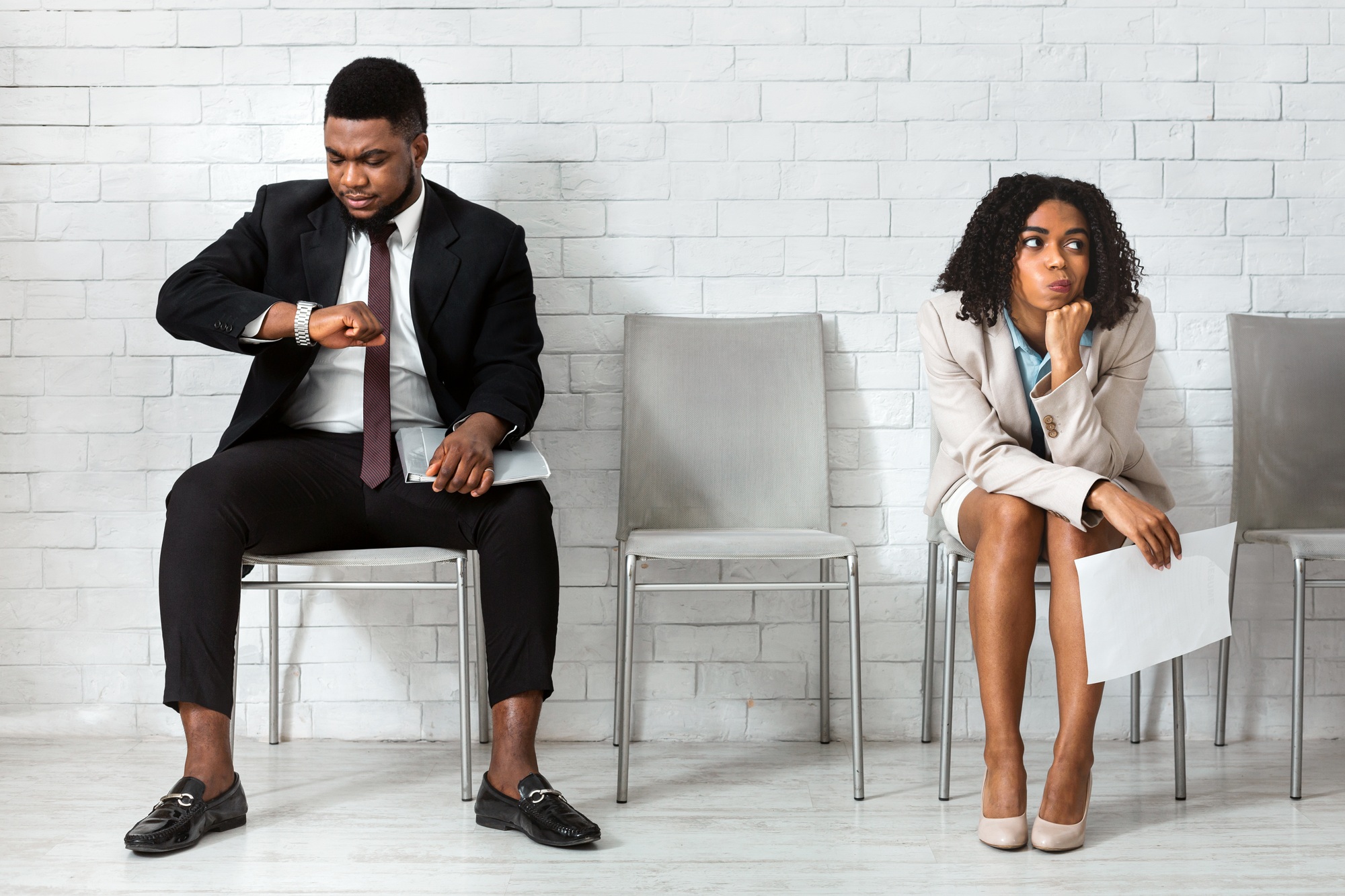Millennial African American people waiting for job interview in office